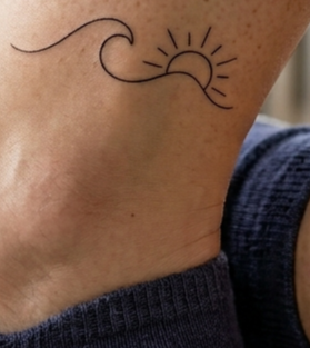 Sonne und Meer Tattoo